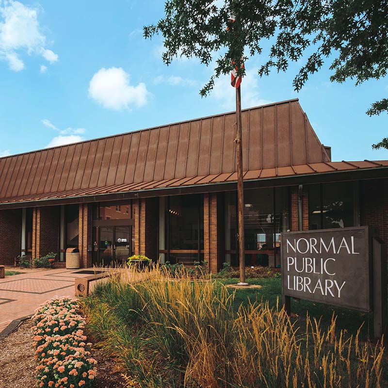 image of normal public library exterior and sign during the day