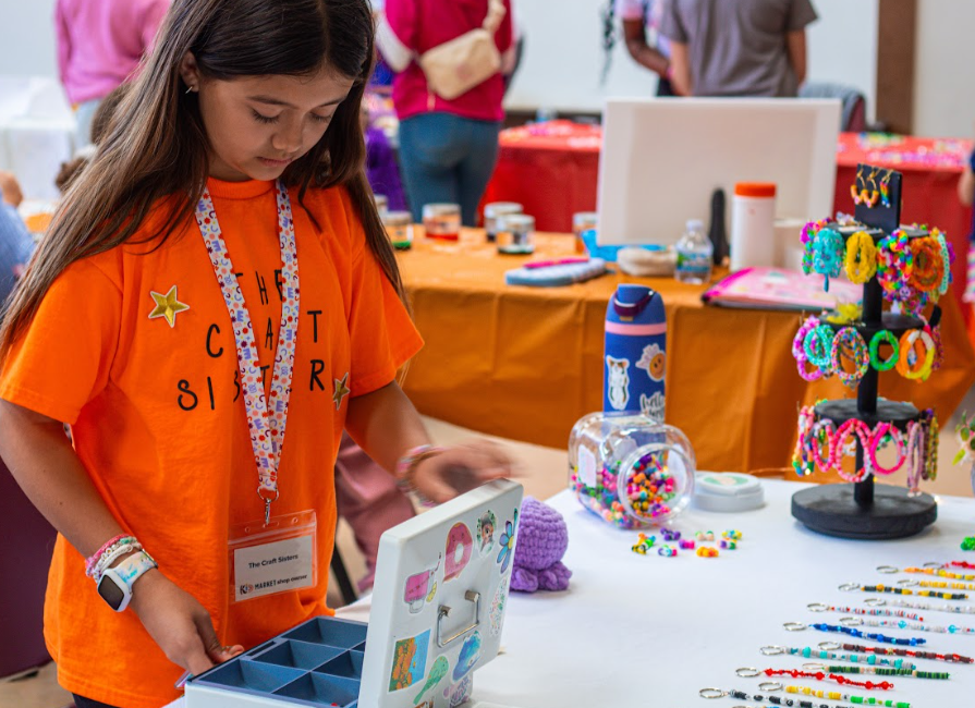 Child selling products at Kid Market