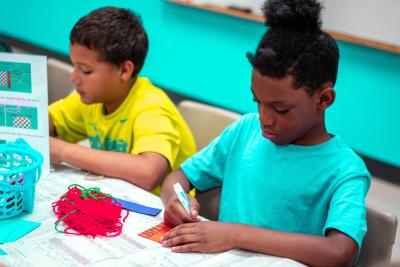 Two boys working on crafts
